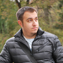 Headshot of Derek Hollis.